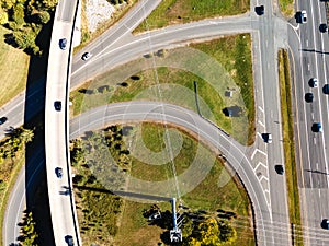 Aerial drone view of elevated road and traffic junctions. Transport highway. Modern construction design of traffic ways to avoid