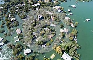 Aerial drone view enitre neighborhood under water major flooding in Central Texas photo