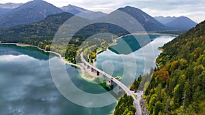 Aerial drone view of Faller-Klamm-Brucke bridge over Silvenstein lake, Karwendel mountain range Alps, Upper Bavaria