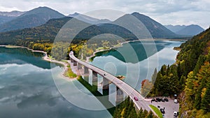 Aerial drone view of Faller-Klamm-Brucke bridge over Silvenstein lake, Karwendel mountain range Alps, Upper Bavaria