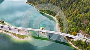 Aerial drone view of Faller-Klamm-Brucke bridge over Silvenstein lake, Karwendel mountain range Alps, Upper Bavaria