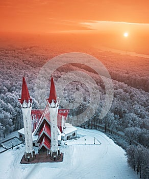 Aerial drone view of famous landmark of Ufa and Bashkiria - Lala Tulip mosque during sunset in winter season. Islamic religion