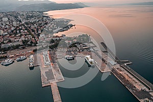 Aerial drone view of ferry port by Split old town before sunrise in morning in Croatia