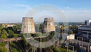 Aerial drone view flight near thermal power plant. Cooling towers of CHP