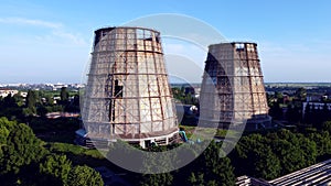 Aerial drone view flight near thermal power plant. Cooling towers of CHP