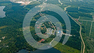 Aerial drone view of forest and lake scenery at Tasik Biru Chinchin, Jasin, Melaka, Malaysia