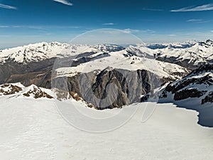 Aerial drone view of French Alps Mountains glacier near Grenoble. Europe alps in winter. Les deux alpes resort. Winter mountains