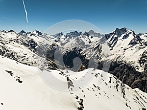 Aerial drone view of French Alps Mountains glacier near Grenoble. Europe alps in winter. Les deux alpes resort. Winter mountains