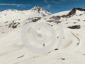 Aerial drone view of French Alps Mountains glacier near Grenoble. Europe alps in winter. Les deux alpes resort. Winter mountains