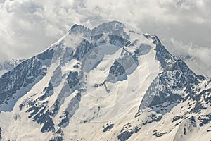 Aerial drone view of French Alps Mountains glacier near Grenoble. Europe alps in winter. Les deux alpes resort. Winter mountains