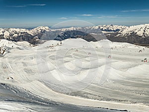 Aerial drone view of French Alps Mountains glacier near Grenoble. Europe alps in winter. Les deux alpes resort. Winter mountains