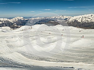 Aerial drone view of French Alps Mountains glacier near Grenoble. Europe alps in winter. Les deux alpes resort. Winter mountains