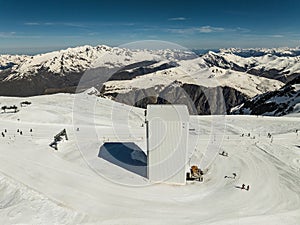 Aerial drone view of French Alps Mountains glacier near Grenoble. Europe alps in winter. Les deux alpes resort. Winter mountains