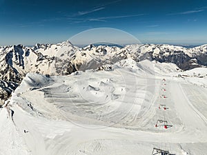 Aerial drone view of French Alps Mountains glacier near Grenoble. Europe alps in winter. Les deux alpes resort. Winter mountains