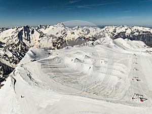 Aerial drone view of French Alps Mountains glacier near Grenoble. Europe alps in winter. Les deux alpes resort. Winter mountains