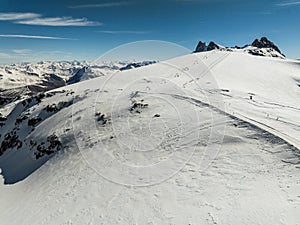 Aerial drone view of French Alps Mountains glacier near Grenoble. Europe alps in winter. Les deux alpes resort. Winter mountains photo