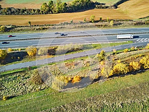 Aerial drone view of French countryside and motorway in France