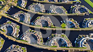 Aerial drone view geometric pattern of water houses, marina, yachts Marina Park Lemmer Netherlands