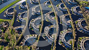 Aerial drone view geometric pattern of water houses, marina, yachts Marina Park Lemmer Netherlands