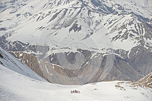 Aerial drone view of Gudauri ski resort in winter. Caucasus mountains in Georgia. Kudebi, Bidara, Sadzele, Kobi aerial panorama