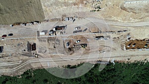 Aerial drone view on highway bridge road under construction. Construction of the viaduct on the modern new road.