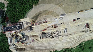 Aerial drone view on highway bridge road under construction. Construction of the viaduct on the modern new road.