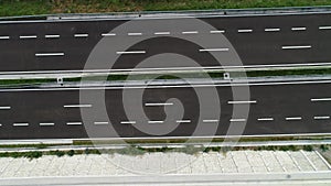 Aerial drone view on highway bridge road under construction. Construction of the viaduct on the modern new road.