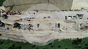 Aerial drone view on highway bridge road under construction. Construction of the viaduct on the modern new road.