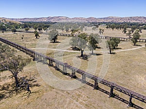 Aerial drone view of the historic Gundagai Railway Viaduct, part of the disused Tumut Railway line near Murrumbidgee River photo