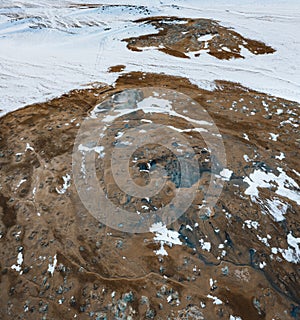 Aerial Drone view of Hverir in Winter with Snow. Icelandic Hverarond is geothermal area in Myvatn, Iceland. Hverir is a
