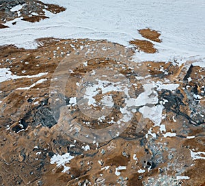 Aerial Drone view of Hverir in Winter with Snow. Icelandic Hverarond is geothermal area in Myvatn, Iceland. Hverir is a