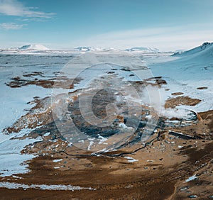 Aerial Drone view of Hverir in Winter with Snow. Icelandic Hverarond is geothermal area in Myvatn, Iceland. Hverir is a