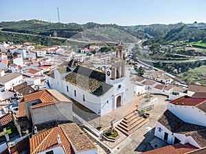Aerial drone view of Iglesia Nuestra SeÃ±ora De Las Flores (Our Lady of Flowers Church) in Sanlucar de Guadiana village photo