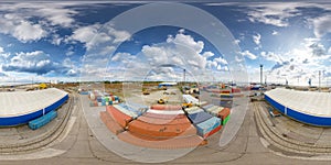 An aerial drone view of the industrial port of Paldiski in the Baltic Sea, Estonia. 360 degrees panorama