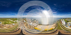 An aerial drone view of the industrial port of Paldiski in the Baltic Sea, Estonia. 360 degrees panorama