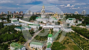 Aerial drone view of Kiev Pechersk Lavra churches on hills from above, cityscape of Kyiv city, Ukraine