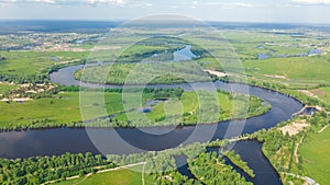 Aerial drone view of Kyiv cityscape, Dnieper and Dniester river, green island from above, Kiev city skyline and parks, Ukraine