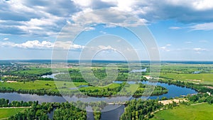 Aerial drone view of Kyiv cityscape, Dnieper and Dniester river, green island from above, Kiev city skyline and parks, Ukraine