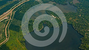 Aerial drone view of lake scenery at Tasik Biru Chinchin, Jasin, Melaka, Malaysia