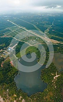 Aerial drone view of lake scenery at Tasik Biru Chinchin, Jasin, Melaka, Malaysia