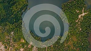 Aerial drone view of lake scenery at Tasik Biru Chinchin, Jasin, Melaka, Malaysia