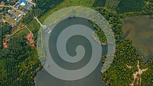 Aerial drone view of lake scenery at Tasik Biru Chinchin, Jasin, Melaka, Malaysia