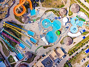 Aerial drone view looking straight down from above colorful summer time fun at water park