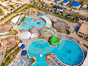 Aerial drone view looking straight down from above colorful summer time fun at water park