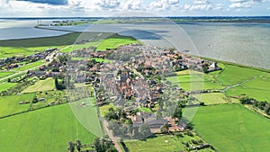 Aerial drone view of Marken island, traditional fisherman village from above, typical Dutch landscape, Holland, Netherlands