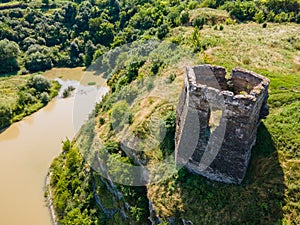 Aerial drone view of a medieval castle among the hills in summer