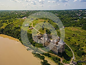 Aerial drone view of a medieval castle among the hills in summer