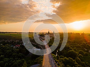 Aerial drone view of a medieval castle among the hills in summer