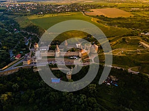 Aerial drone view of a medieval castle among the hills in summer