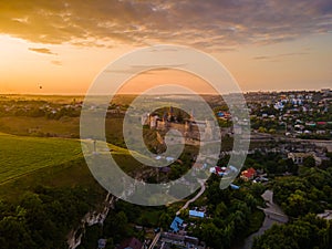 Aerial drone view of a medieval castle among the hills in summer